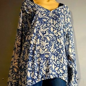 top for women, or dress for a lady.